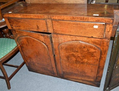 Lot 590 - Oak side cabinet with two drawers and arched panel cupboard doors