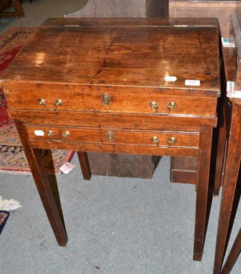 Lot 597 - Small elm slope front bureau on stand