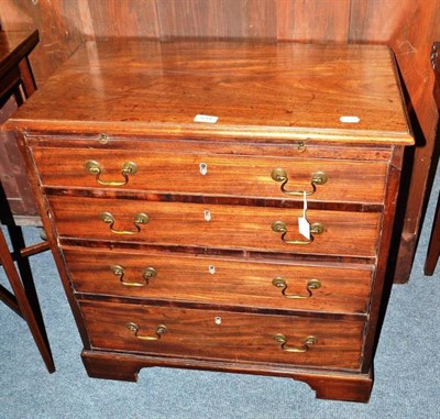 Lot 614 - A Georgian mahogany small four height chest of drawers