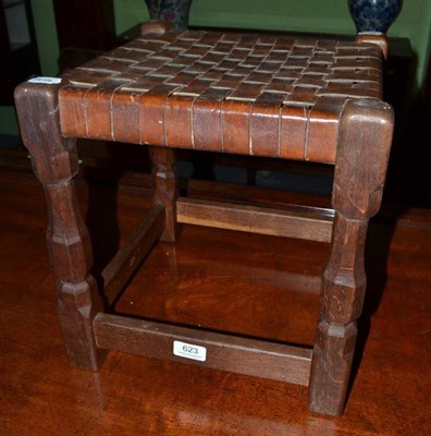 Lot 623 - Mouseman style stool with leather seat