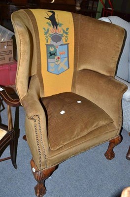 Lot 628 - Georgian style wing back chair with Armorial shield