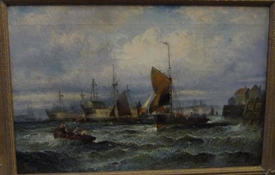 Lot 687 - Hubert Thornley (fl.1859-1898) Fishing boats with figures and other shipping nearby Signed, oil...