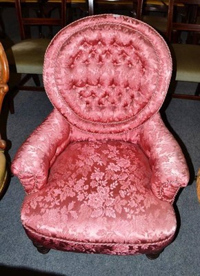 Lot 644 - A 19th century mahogany framed armchair with button back, upholstered in pink