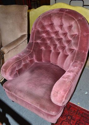 Lot 654 - A 1930's pink button back armchair