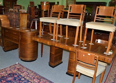 Lot 672 - An Art Deco Waring & Gillows dining room suite, comprising extending dining table, sideboard...