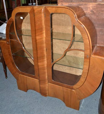 Lot 673 - An Art Deco walnut cloud china cabinet, with two shelves, 137cm wide, 32cm deep, 120.5cm high