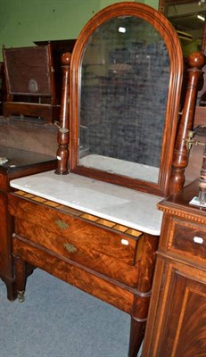 Lot 684 - A 19th century Empire style mahogany washstand with marble top, sconces and fitted interior to...