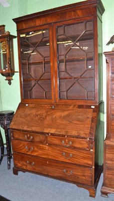 Lot 704 - Georgian mahogany bureau bookcase