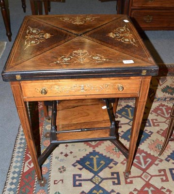 Lot 710 - A rosewood envelope card table