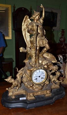 Lot 717 - A gilt metal striking mantel clock