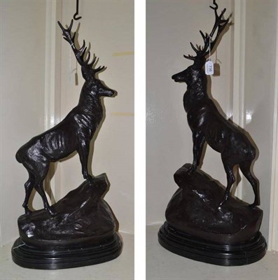 Lot 736 - Pair of reproduction bronze figures of stags