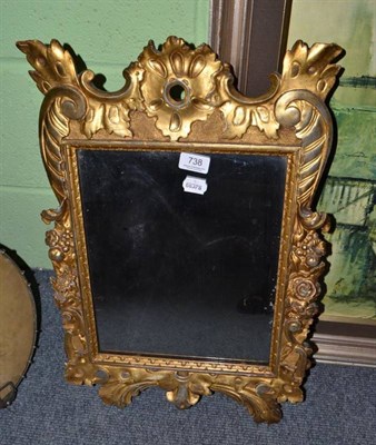 Lot 738 - An 18th century carved giltwood pier glass