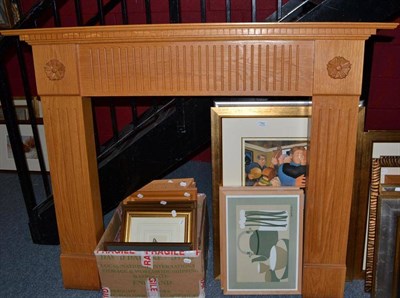 Lot 761 - A modern oak fire surround, the rectangular top over dentil decoration, with two carved roses,...