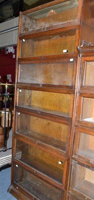 Lot 767 - A seven height oak glazed stacking bookcase