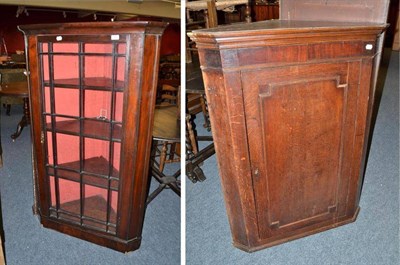 Lot 785 - Mahogany glazed standing corner cabinet and another in oak