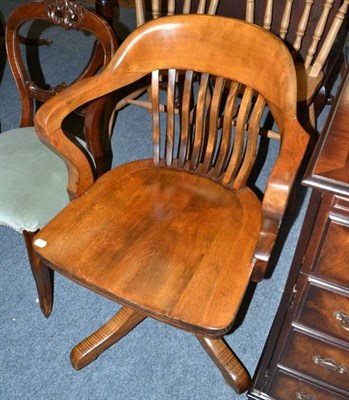 Lot 800 - Revolving oak captains chair