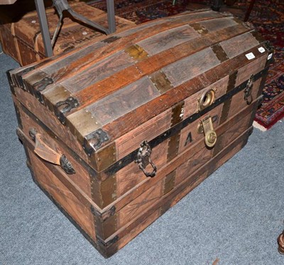 Lot 814 - An oak bound domed travelling trunk initialled 'AP'