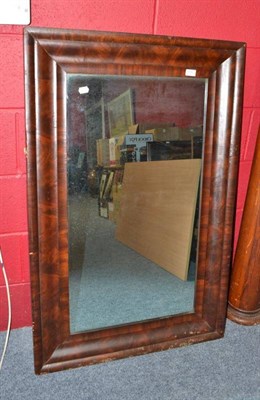 Lot 830 - A mahogany wall mirror