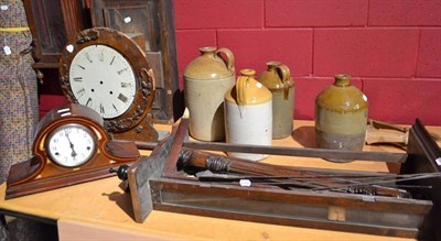 Lot 833 - Four wall clock cases, chiming mantel clock, striking wall clock, four stoneware flagons and a...