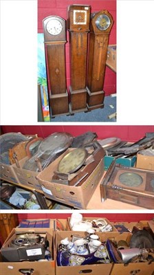 Lot 849 - Twelve boxes of clock parts, pottery books and five clocks