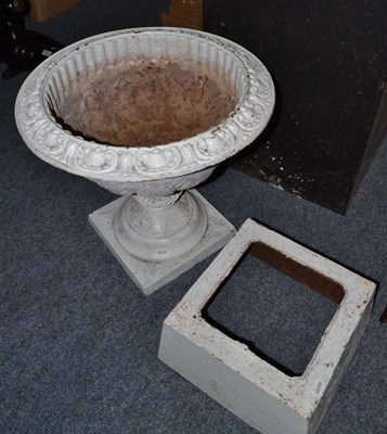 Lot 872 - A white painted cast iron garden pedestal on stand