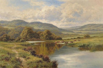 Lot 712 - Henry H Parker (1858-1930)  River landscape with cattle watering  Signed, oil on canvas, 49cm...