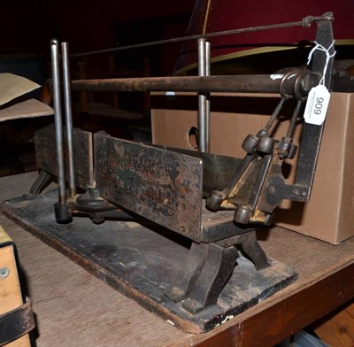 Lot 909 - Vintage mitre saw in stand