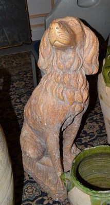 Lot 934 - Stoneware figure of a seated dog