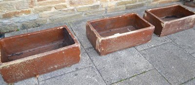 Lot 946 - Three brown glazed stoneware troughs