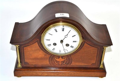 Lot 16 - An inlaid striking mantel clock