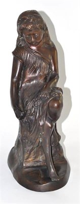 Lot 30 - A modern bronze of a young girl sat on a tree stump