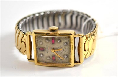 Lot 62 - A 14K gold gem-set wristwatch