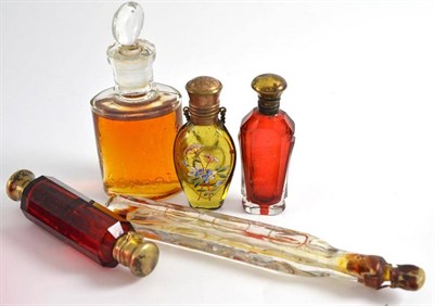 Lot 82 - Silver gilt and cranberry glass double scent flask and four other scent flasks and bottles