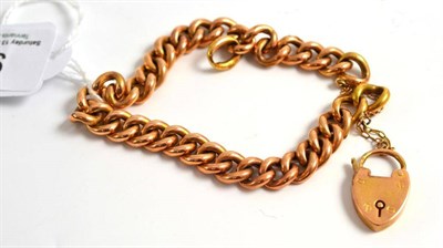 Lot 95 - A curb and lock bracelet