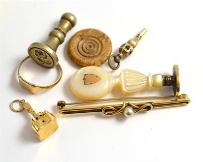 Lot 99 - A Neo-Classical mother-of-pearl hand seal, a white metal seal, a 14ct gold seal fob, a 9ct gold...