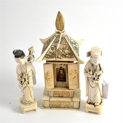 Lot 118 - A Chinese bone and ivory table shrine and a pair of Chinese ivory figures circa 1920