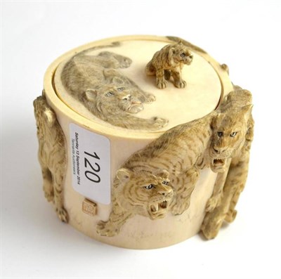 Lot 120 - A Japanese ivory box and cover, carved with tigers, circa 1900