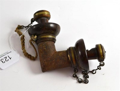 Lot 123 - A rosewood and metal whistle