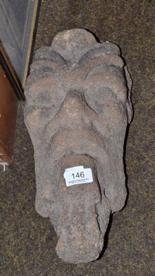 Lot 146 - A stone face