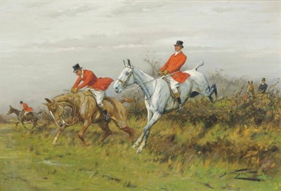 Lot 734 - George Wright (1860-1942) Huntsman on horseback jumping a hedge, other figures looking on...