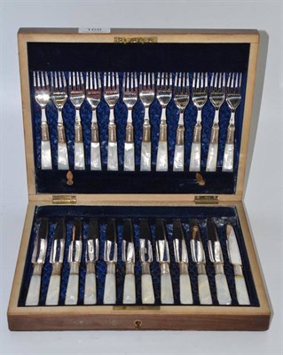Lot 168 - A mahogany cased set of twelve cake knives and forks with mother-of-pearl handles and electroplated