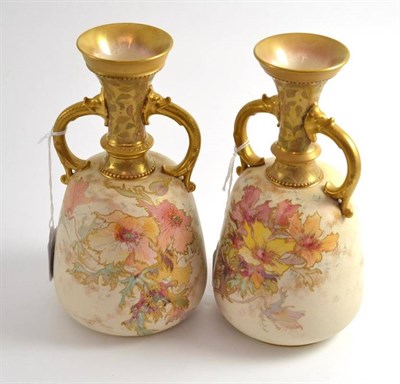 Lot 174 - A pair of Doulton Burslem twin handled vases