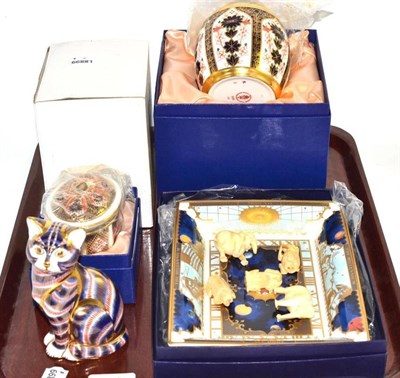 Lot 179 - Three boxed items of Royal Crown Derby comprising: a cat paperweight with gold stopper, an...