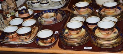 Lot 186 - A Noritake desert painted part tea service, twelve place setting (on two trays)