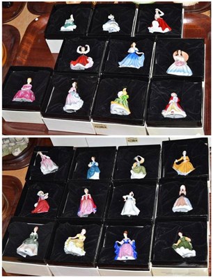 Lot 189 - Twenty-one Royal Doulton miniature figures (boxed) and a stand