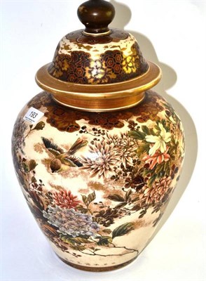 Lot 193 - A Japanese earthenware pottery vase and cover, late Meiji period, decorated with sparrows...
