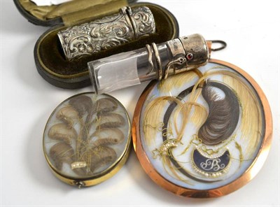 Lot 214 - Cased silver scent bottle, another with snake decoration and two mourning miniatures