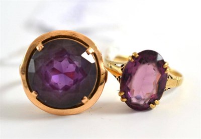 Lot 216 - A 9ct gold ring and another set with an amethyst type stone (2)