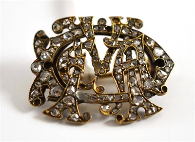 Lot 223 - A gold and diamond initials brooch