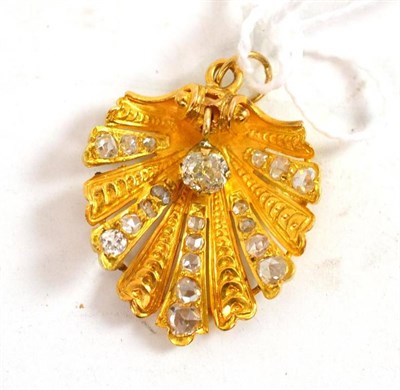 Lot 242 - A Victorian gold and diamond shell pendant